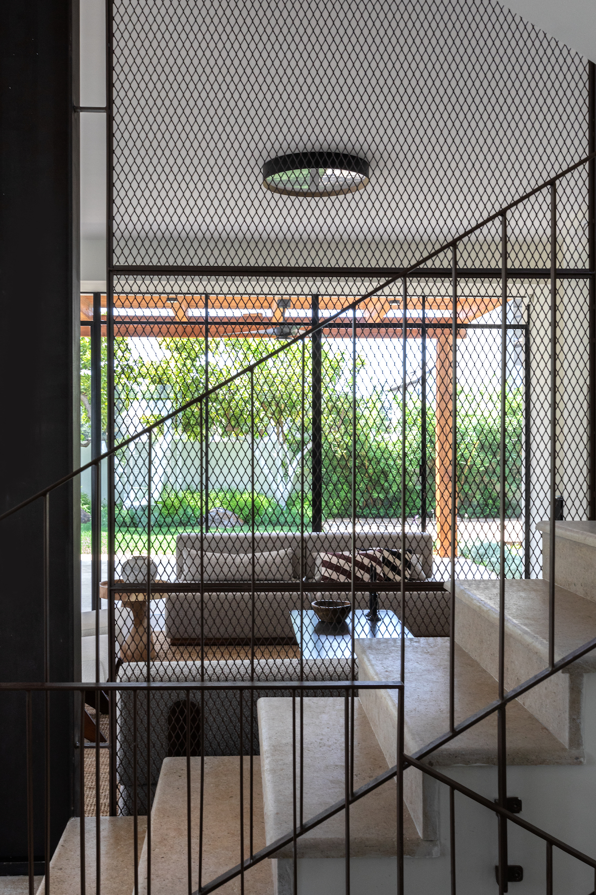 A metal partition wall in a minimal home