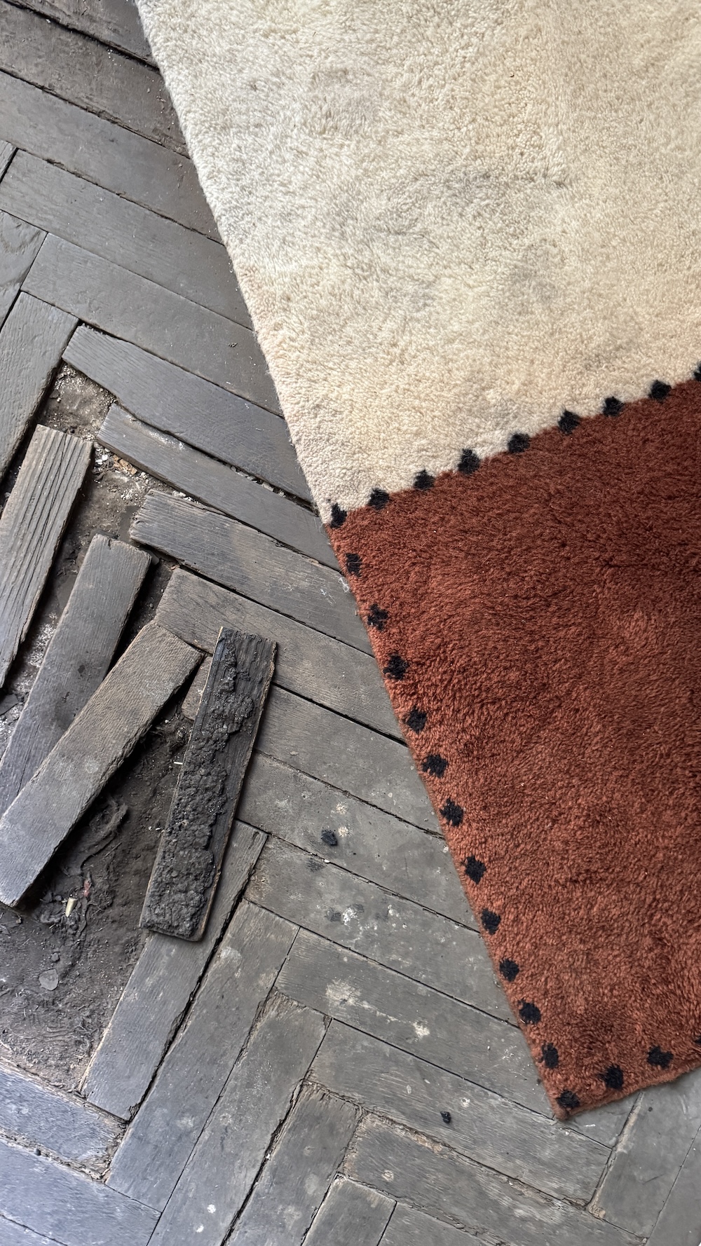 Handwoven Moroccan rug from the ‘Intersection’ collection by Studio KO for Beni Rugs, shown at 5Vie during Milan Design Week. 