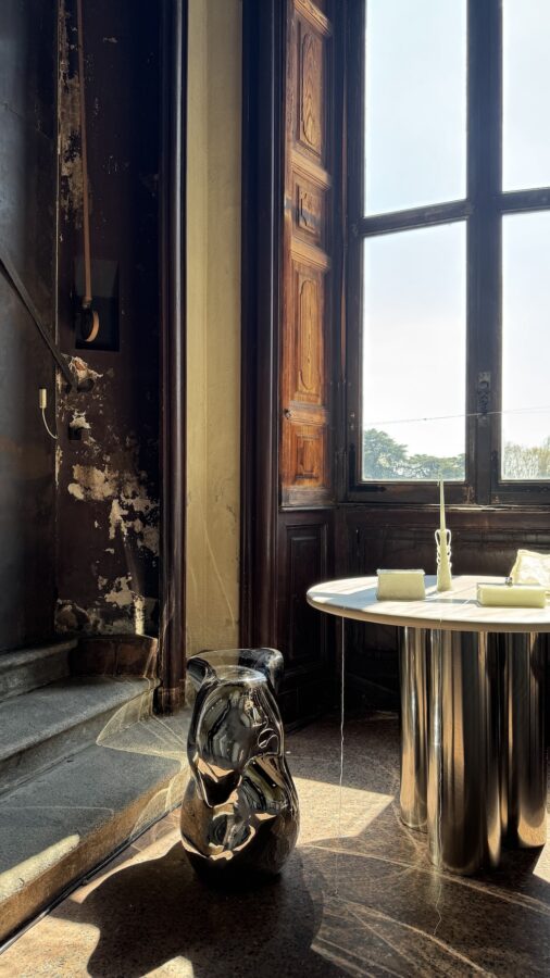 Designers' installations inside Villa Bagatti Valsecchi at Alcova 2025, blending contemporary pieces with the villa’s historic architecture and high ceilings.