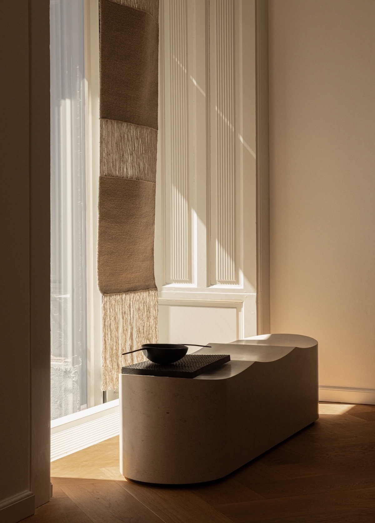 Echoes of Texture exhibition by Linie Design and Karimoku Case at 3 Days of Design 2025, featuring handwoven rugs from the Woven Matter collection displayed on wooden frames inspired by Japanese Shinto gateways, with contributions from Norm Architects, Urd Moll Gundermann, Foster + Partners, and Keiji Ashizawa Design