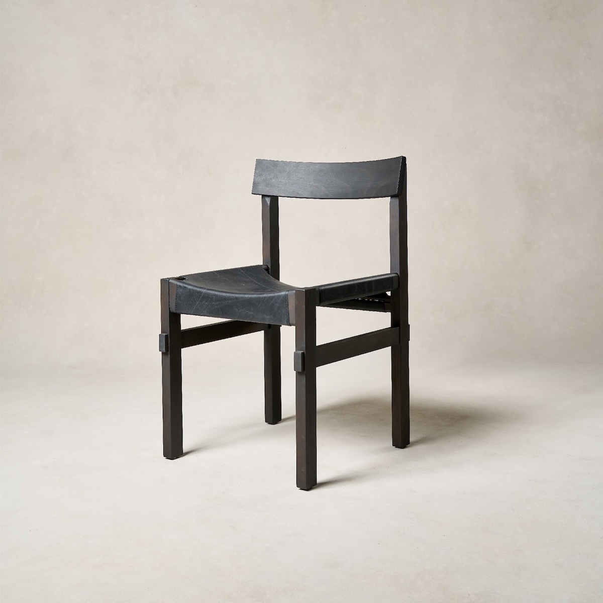 The Shinto Dining Chair was designed as an ode to the traditional Japanese Torii Gate found at the entrances of Shinto shrines.